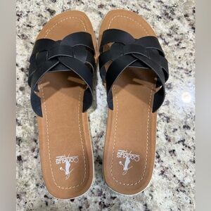 Brand new black flat sandals with white bottom